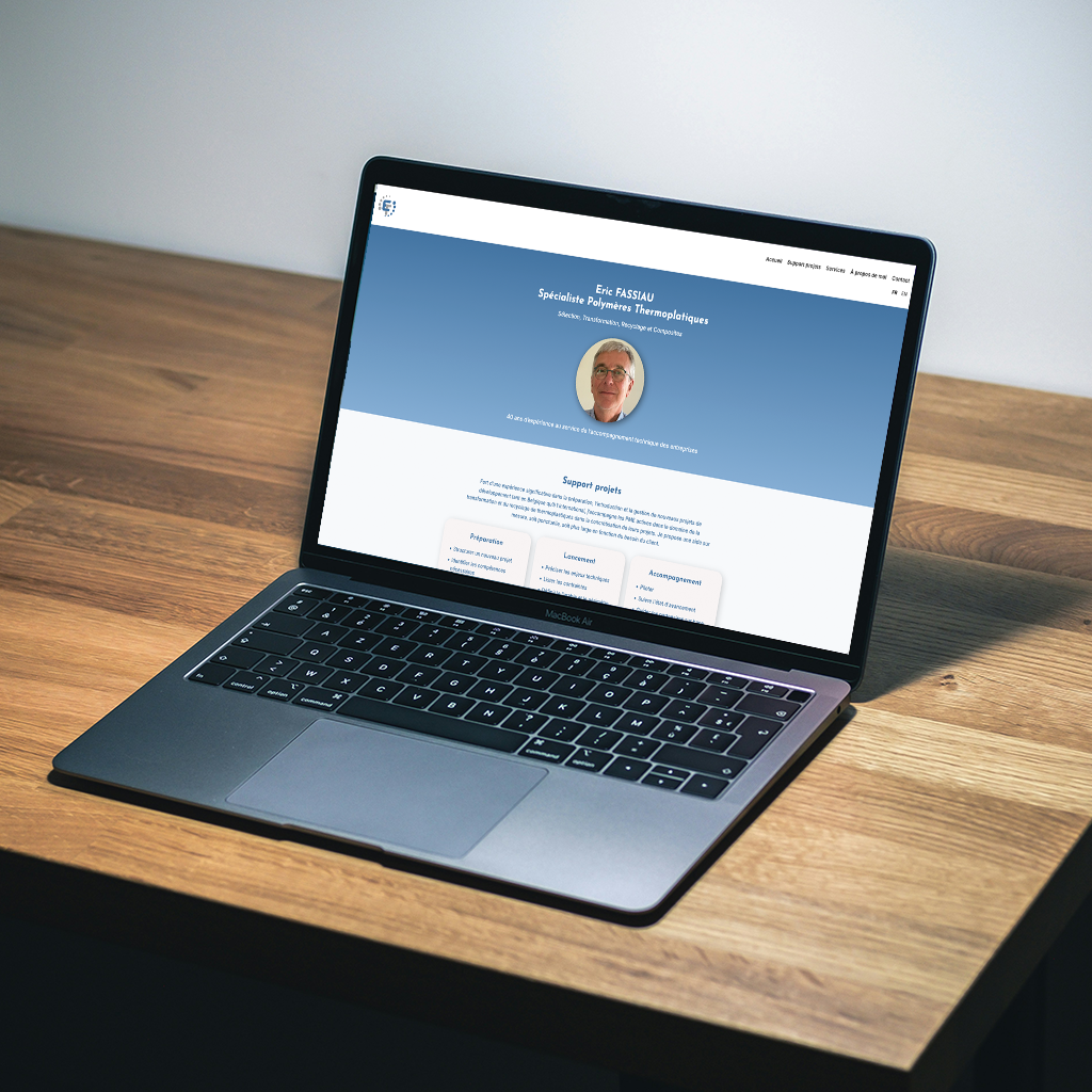 modern minimalist e-commerce website mockup on laptop, navy and white palette, clean editorial layou